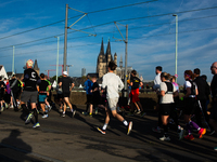 Thousands of people take part in the traditional Cologne Marathon in Cologne, Germany, on October 6, 2024. (