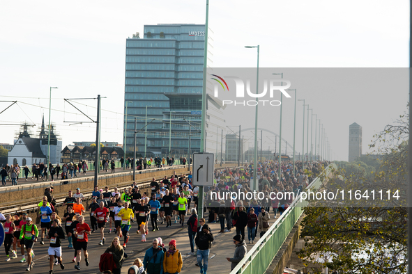 Thousands of people take part in the traditional Cologne Marathon in Cologne, Germany, on October 6, 2024. 