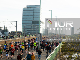 Thousands of people take part in the traditional Cologne Marathon in Cologne, Germany, on October 6, 2024. (