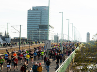 Thousands of people take part in the traditional Cologne Marathon in Cologne, Germany, on October 6, 2024. (