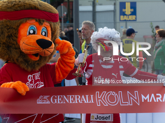 Thousands of people take part in the traditional Cologne Marathon in Cologne, Germany, on October 6, 2024. (