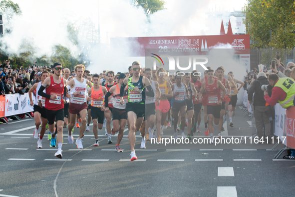 Thousands of people take part in the traditional Cologne Marathon in Cologne, Germany, on October 6, 2024. 