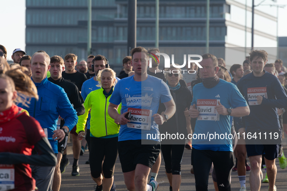 Thousands of people take part in the traditional Cologne Marathon in Cologne, Germany, on October 6, 2024. 