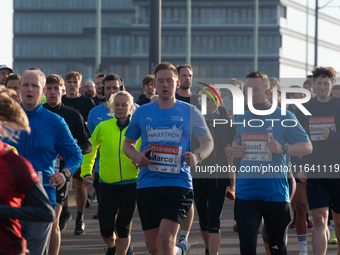 Thousands of people take part in the traditional Cologne Marathon in Cologne, Germany, on October 6, 2024. (