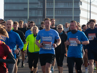 Thousands of people take part in the traditional Cologne Marathon in Cologne, Germany, on October 6, 2024. (