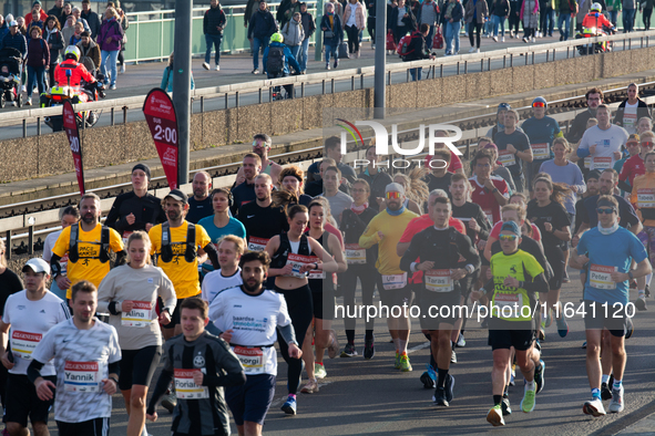 Thousands of people take part in the traditional Cologne Marathon in Cologne, Germany, on October 6, 2024. 