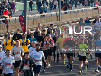 Thousands of people take part in the traditional Cologne Marathon in Cologne, Germany, on October 6, 2024. (