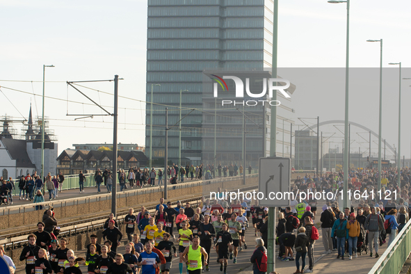 Thousands of people take part in the traditional Cologne Marathon in Cologne, Germany, on October 6, 2024. 