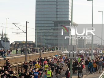 Thousands of people take part in the traditional Cologne Marathon in Cologne, Germany, on October 6, 2024. (