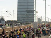 Thousands of people take part in the traditional Cologne Marathon in Cologne, Germany, on October 6, 2024. (