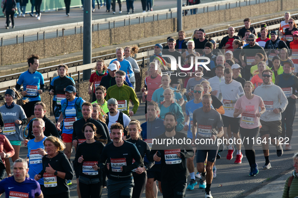 Thousands of people take part in the traditional Cologne Marathon in Cologne, Germany, on October 6, 2024. 