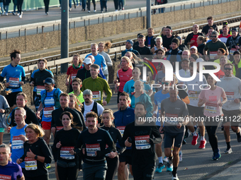 Thousands of people take part in the traditional Cologne Marathon in Cologne, Germany, on October 6, 2024. (