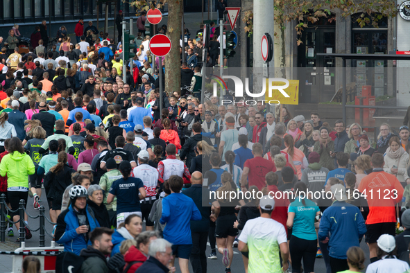 Thousands of people take part in the traditional Cologne Marathon in Cologne, Germany, on October 6, 2024. 