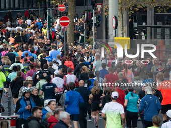 Thousands of people take part in the traditional Cologne Marathon in Cologne, Germany, on October 6, 2024. (