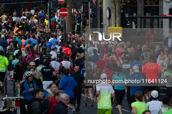 Thousands of people take part in the traditional Cologne Marathon in Cologne, Germany, on October 6, 2024. 