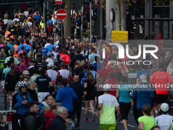 Thousands of people take part in the traditional Cologne Marathon in Cologne, Germany, on October 6, 2024. (