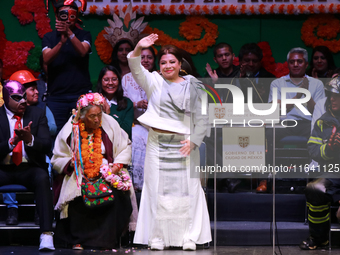 The new Head of Government of Mexico City, Clara Brugada, waves during the celebration ceremony following her inauguration, where she meets...