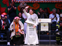 The new Head of Government of Mexico City, Clara Brugada, waves during the celebration ceremony following her inauguration, where she meets...