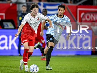 FC Utrecht midfielder Paxten Aaronson and RKC midfielder Daouda Weidmann play during the match between Utrecht and RKC at Stadium de Galgenw...