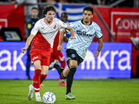 FC Utrecht midfielder Paxten Aaronson and RKC midfielder Daouda Weidmann play during the match between Utrecht and RKC at Stadium de Galgenw...