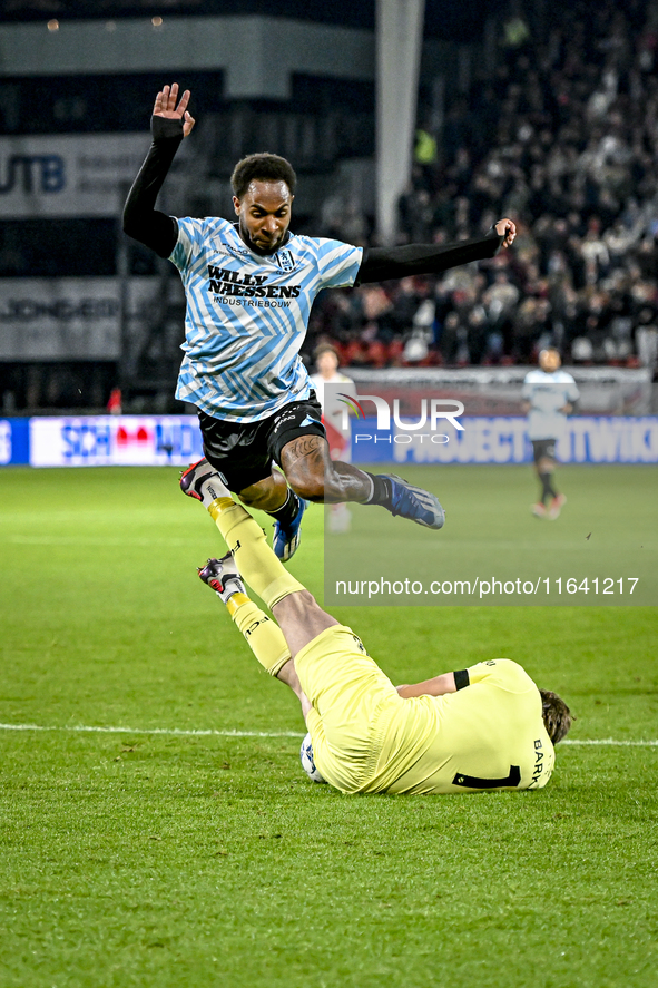 FC Utrecht goalkeeper Vasilis Barkas and RKC forward Denilho Cleonise participate in the match between Utrecht and RKC at Stadium de Galgenw...