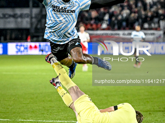 FC Utrecht goalkeeper Vasilis Barkas and RKC forward Denilho Cleonise participate in the match between Utrecht and RKC at Stadium de Galgenw...