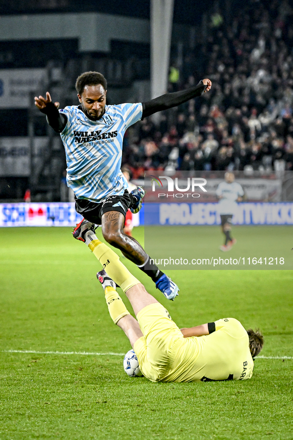 FC Utrecht goalkeeper Vasilis Barkas and RKC forward Denilho Cleonise participate in the match between Utrecht and RKC at Stadium de Galgenw...