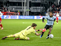 FC Utrecht goalkeeper Vasilis Barkas and RKC forward Denilho Cleonise participate in the match between Utrecht and RKC at Stadium de Galgenw...