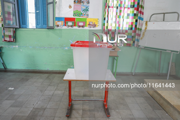 An empty ballot box is in a polling station during the presidential election in Ariana, a suburb of Tunis, Tunisia, on October 6, 2024. Tuni...