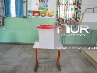 An empty ballot box is in a polling station during the presidential election in Ariana, a suburb of Tunis, Tunisia, on October 6, 2024. Tuni...