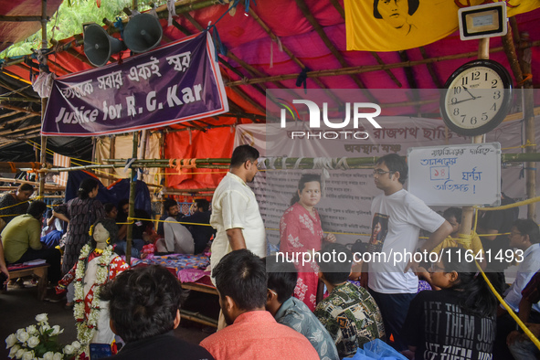 Junior doctors hold a hunger strike to protest against the rape and murder of a PGT woman doctor at Government-run R G Kar Medical College &...