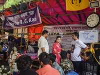 Junior doctors hold a hunger strike to protest against the rape and murder of a PGT woman doctor at Government-run R G Kar Medical College &...