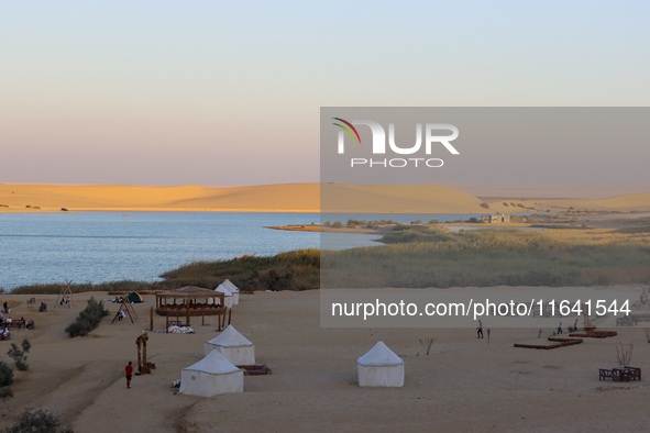 The Magic Lake is a lake located in Wadi El Hitan in Fayoum. It overlooks sand dunes and provides the opportunity to witness sunsets. The la...