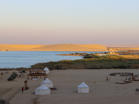 The Magic Lake is a lake located in Wadi El Hitan in Fayoum. It overlooks sand dunes and provides the opportunity to witness sunsets. The la...