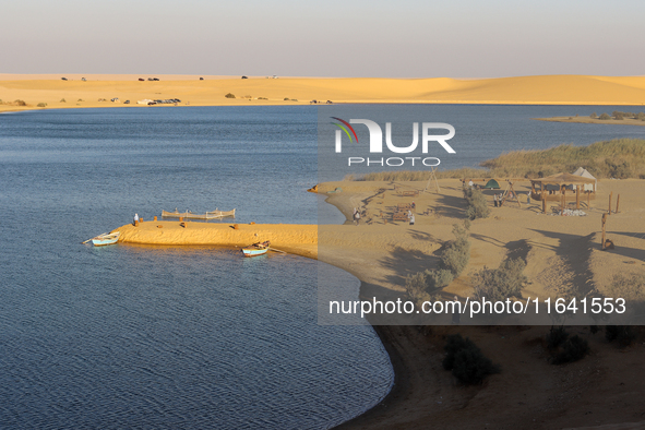 The Magic Lake is a lake located in Wadi El Hitan in Fayoum. It overlooks sand dunes and provides the opportunity to witness sunsets. The la...