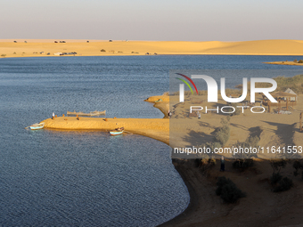 The Magic Lake is a lake located in Wadi El Hitan in Fayoum. It overlooks sand dunes and provides the opportunity to witness sunsets. The la...