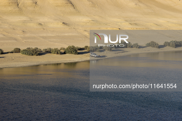 The Magic Lake is a lake located in Wadi El Hitan in Fayoum. It overlooks sand dunes and provides the opportunity to witness sunsets. The la...