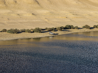 The Magic Lake is a lake located in Wadi El Hitan in Fayoum. It overlooks sand dunes and provides the opportunity to witness sunsets. The la...