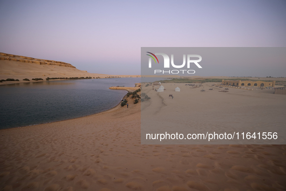 The Magic Lake is a lake located in Wadi El Hitan in Fayoum. It overlooks sand dunes and provides the opportunity to witness sunsets. The la...