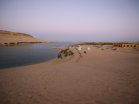 The Magic Lake is a lake located in Wadi El Hitan in Fayoum. It overlooks sand dunes and provides the opportunity to witness sunsets. The la...