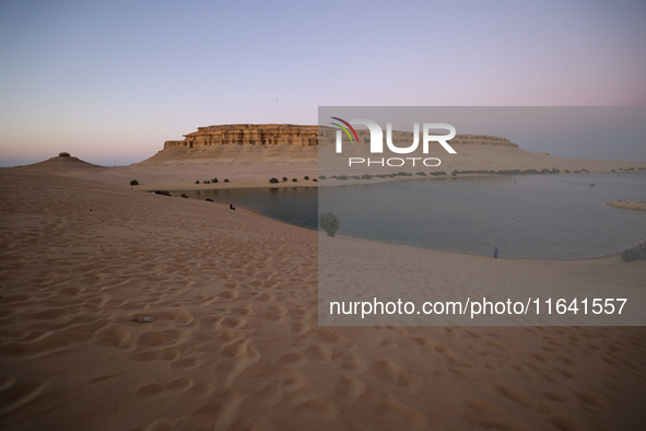 The Magic Lake is a lake located in Wadi El Hitan in Fayoum. It overlooks sand dunes and provides the opportunity to witness sunsets. The la...