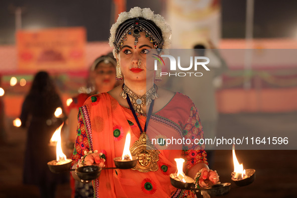 A participant performs during the Dainik Bhaskar Abhivyakti 'Garba Mahotsav' on the occasion of the 'Navratri festival' in Jaipur, Rajasthan...