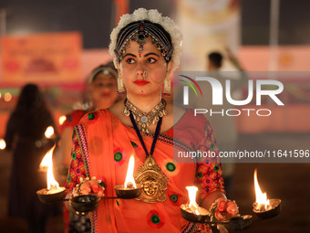 A participant performs during the Dainik Bhaskar Abhivyakti 'Garba Mahotsav' on the occasion of the 'Navratri festival' in Jaipur, Rajasthan...