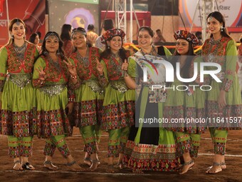 Participants perform 'Garba' during the Dainik Bhaskar Abhivyakti 'Garba Mahotsav' on the occasion of the 'Navratri festival' in Jaipur, Raj...