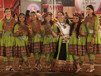 Participants perform 'Garba' during the Dainik Bhaskar Abhivyakti 'Garba Mahotsav' on the occasion of the 'Navratri festival' in Jaipur, Raj...