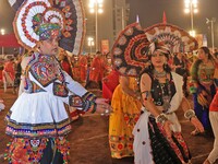 Participants perform 'Garba' during the Dainik Bhaskar Abhivyakti 'Garba Mahotsav' on the occasion of the 'Navratri festival' in Jaipur, Raj...