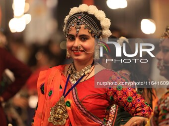 A participant takes part in the Dainik Bhaskar Abhivyakti 'Garba Mahotsav' during the 'Navratri festival' in Jaipur, Rajasthan, India, on Oc...