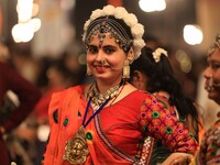 A participant takes part in the Dainik Bhaskar Abhivyakti 'Garba Mahotsav' during the 'Navratri festival' in Jaipur, Rajasthan, India, on Oc...