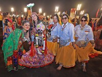 Participants attend the Dainik Bhaskar Abhivyakti 'Garba Mahotsav' during the 'Navratri festival' in Jaipur, Rajasthan, India, on October 5,...