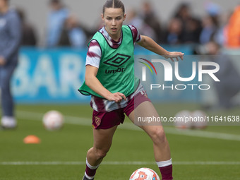 A West Ham United F.C. player warms up during the Barclays FA Women's Super League match between Manchester City and West Ham United at the...